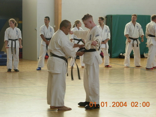 picture - Senpai Jamie Receives His Black Belt.jpg